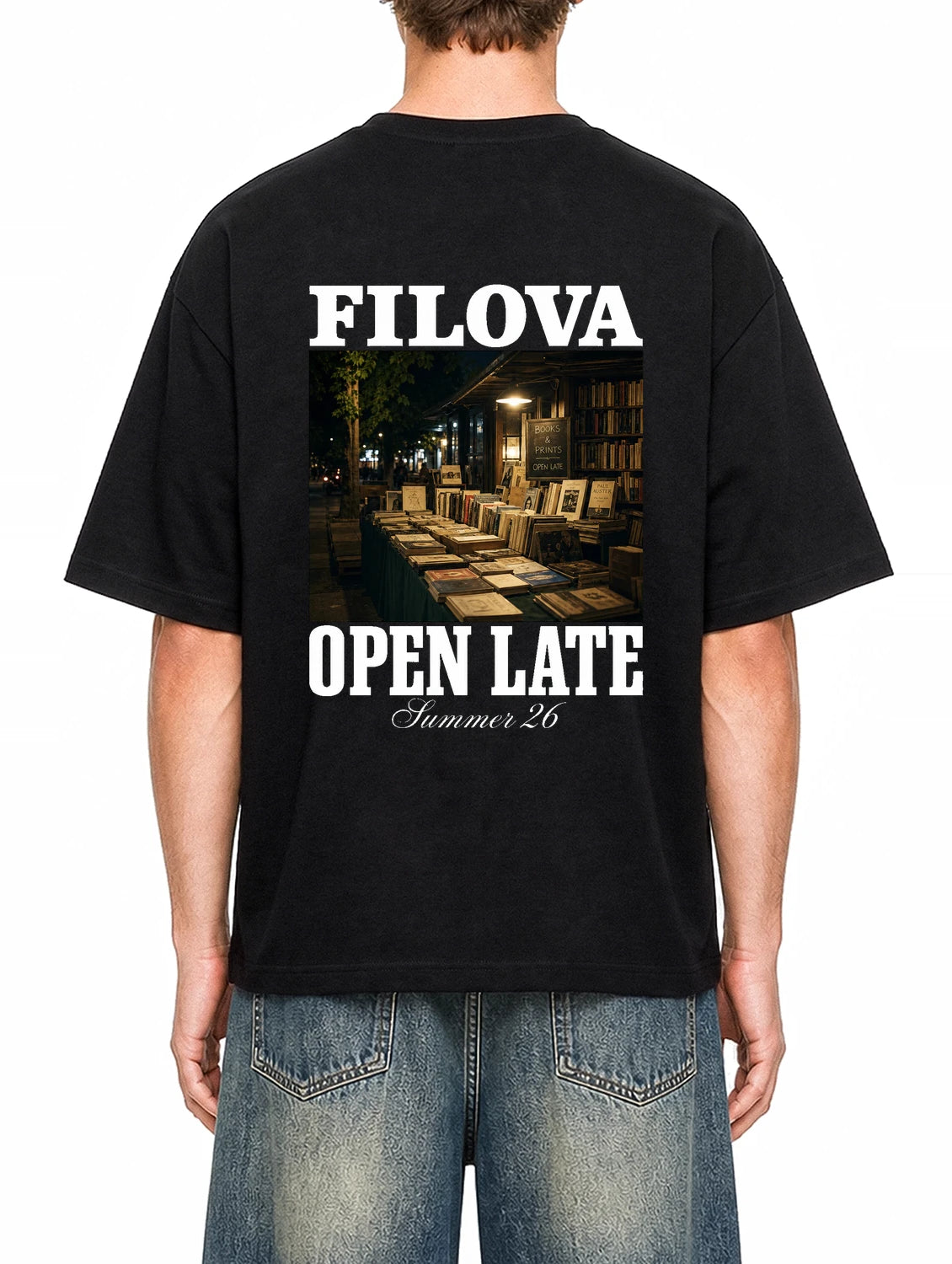 Open Late Book Market Black graphic T-shirt on model, back view