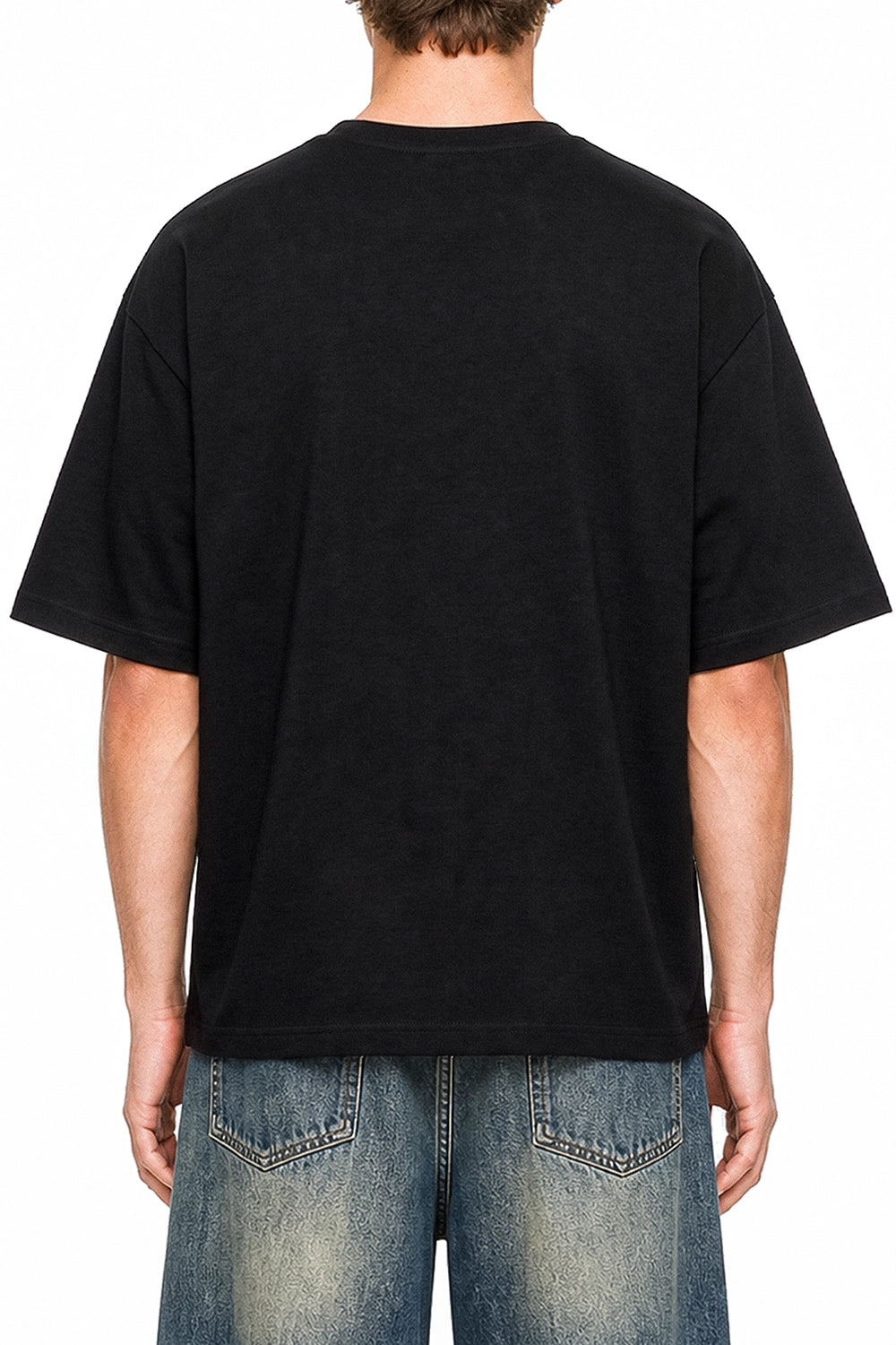 Just Guessing Black graphic T-shirt on model, back view