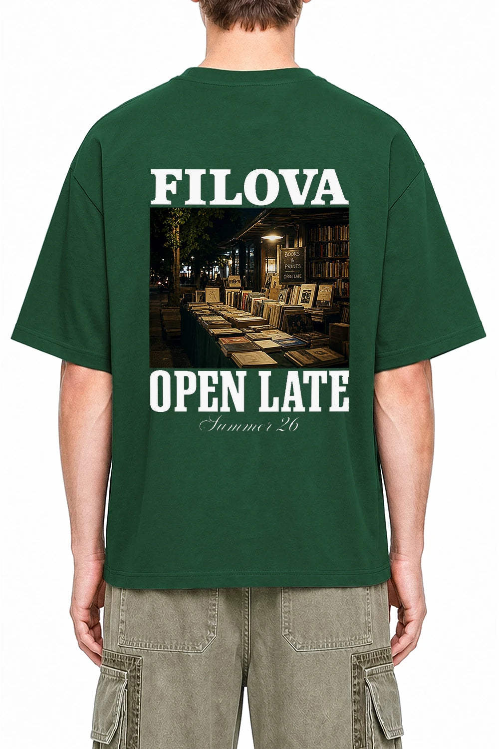 Open Late Book Market Dark Green graphic T-shirt on model, back view