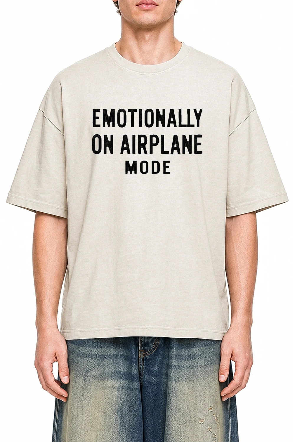 Emotionally On Airplane Mode Apricot graphic T-shirt on model, front view