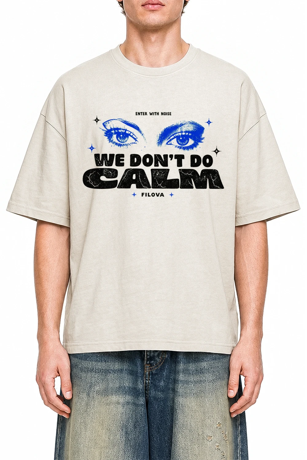 We Don't Do Calm Apricot graphic T-shirt on model, front view