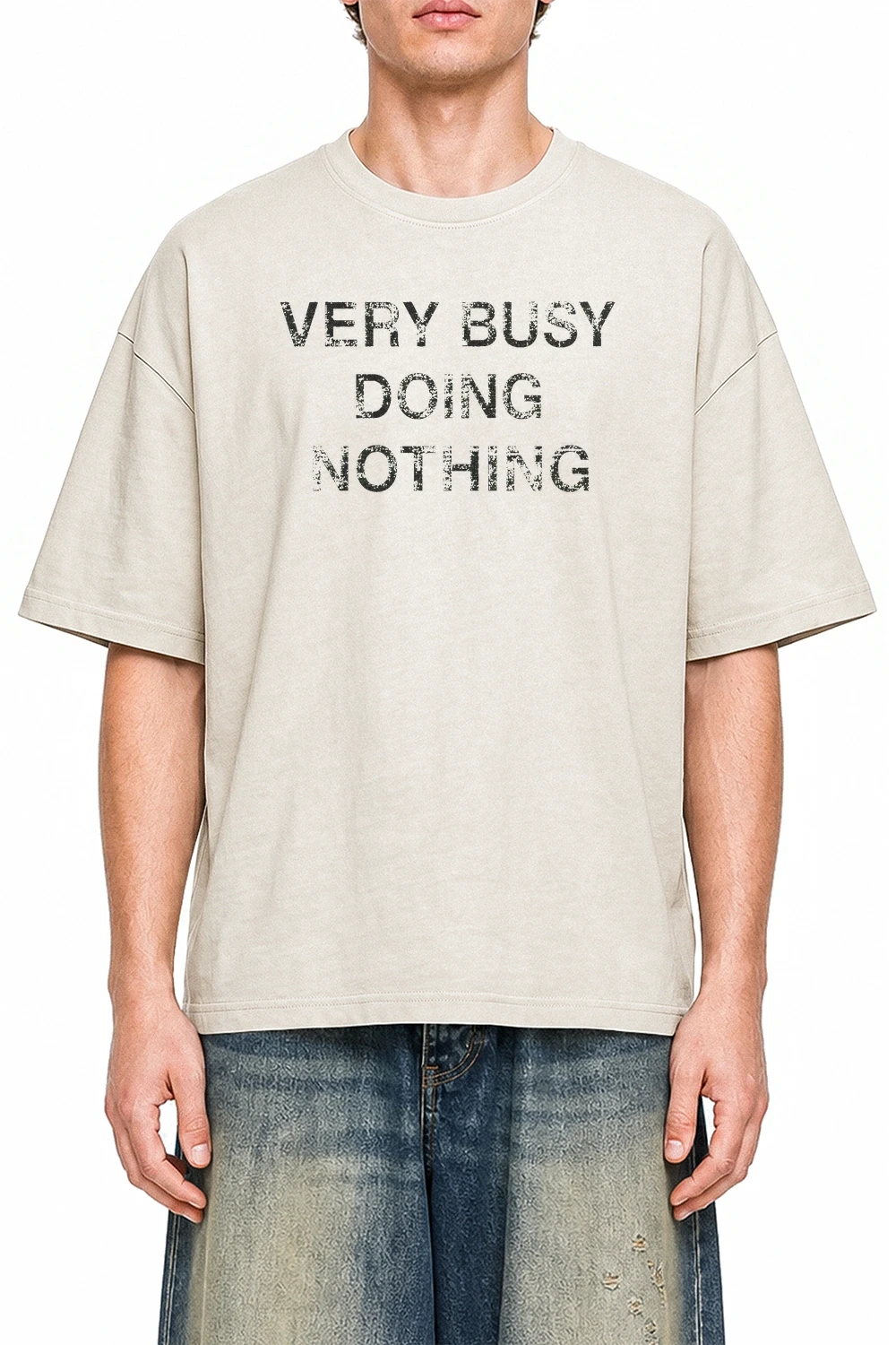 Very Busy Doing Nothing Apricot graphic T-shirt on model, front view