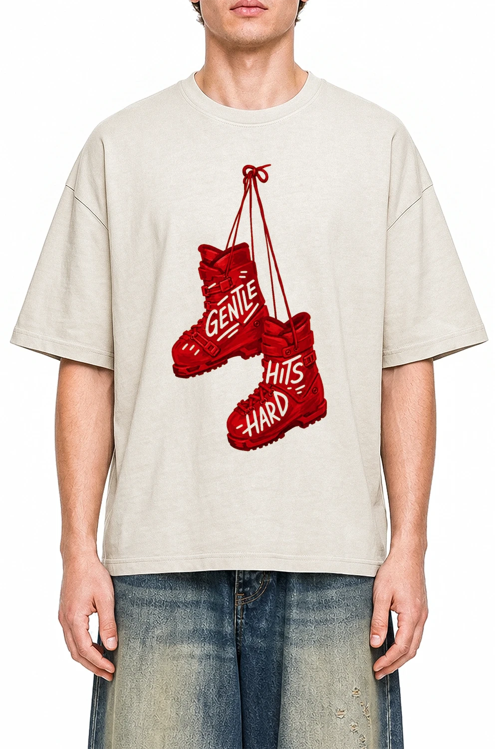 Gentle Hits Hard Apricot graphic T-shirt on model, front view
