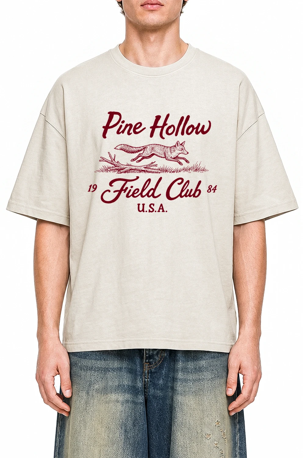 Pine Hollow Field Club Apricot graphic T-shirt on model, front view