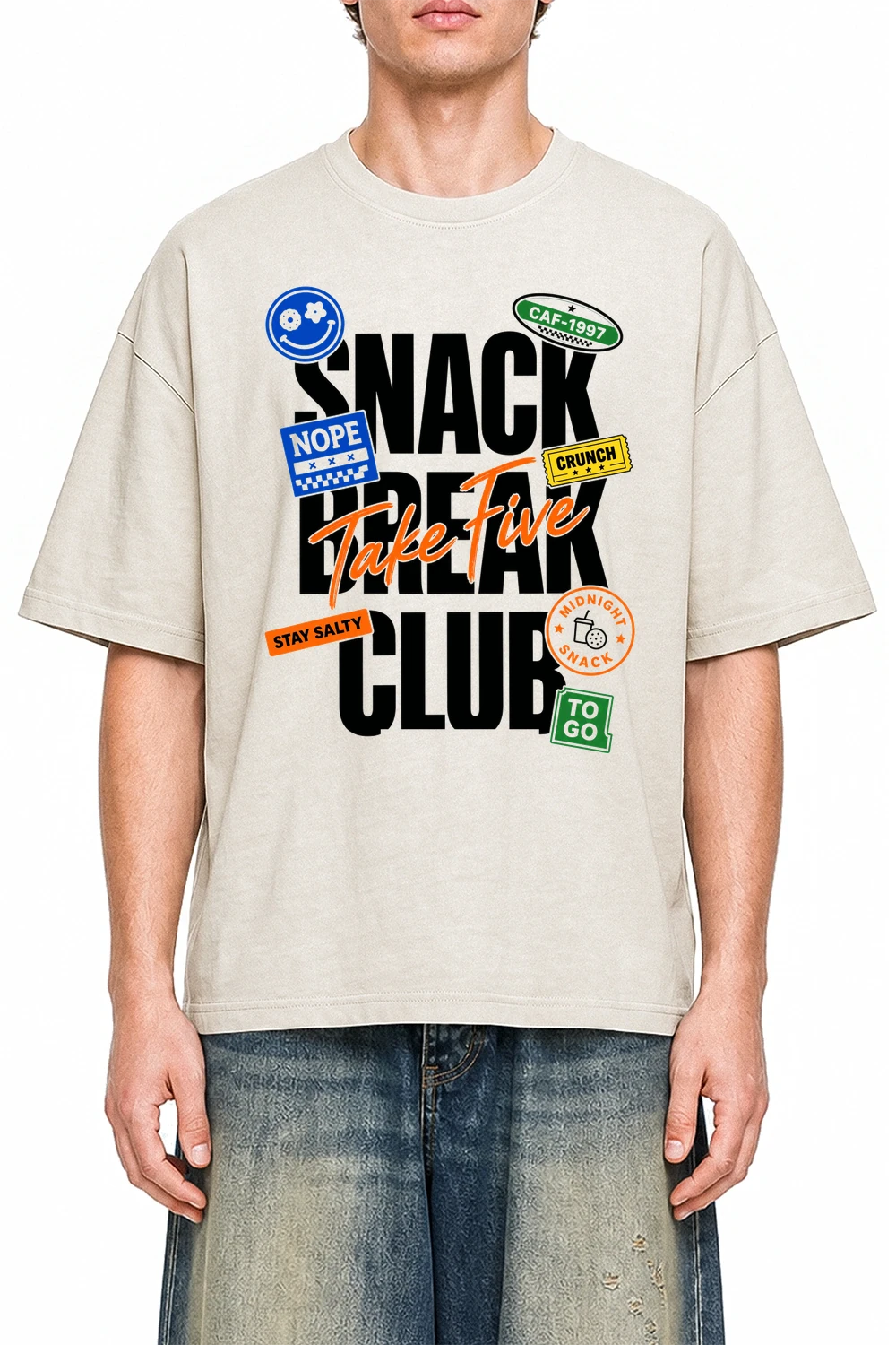 Snack Break Club Apricot graphic T-shirt on model, front view