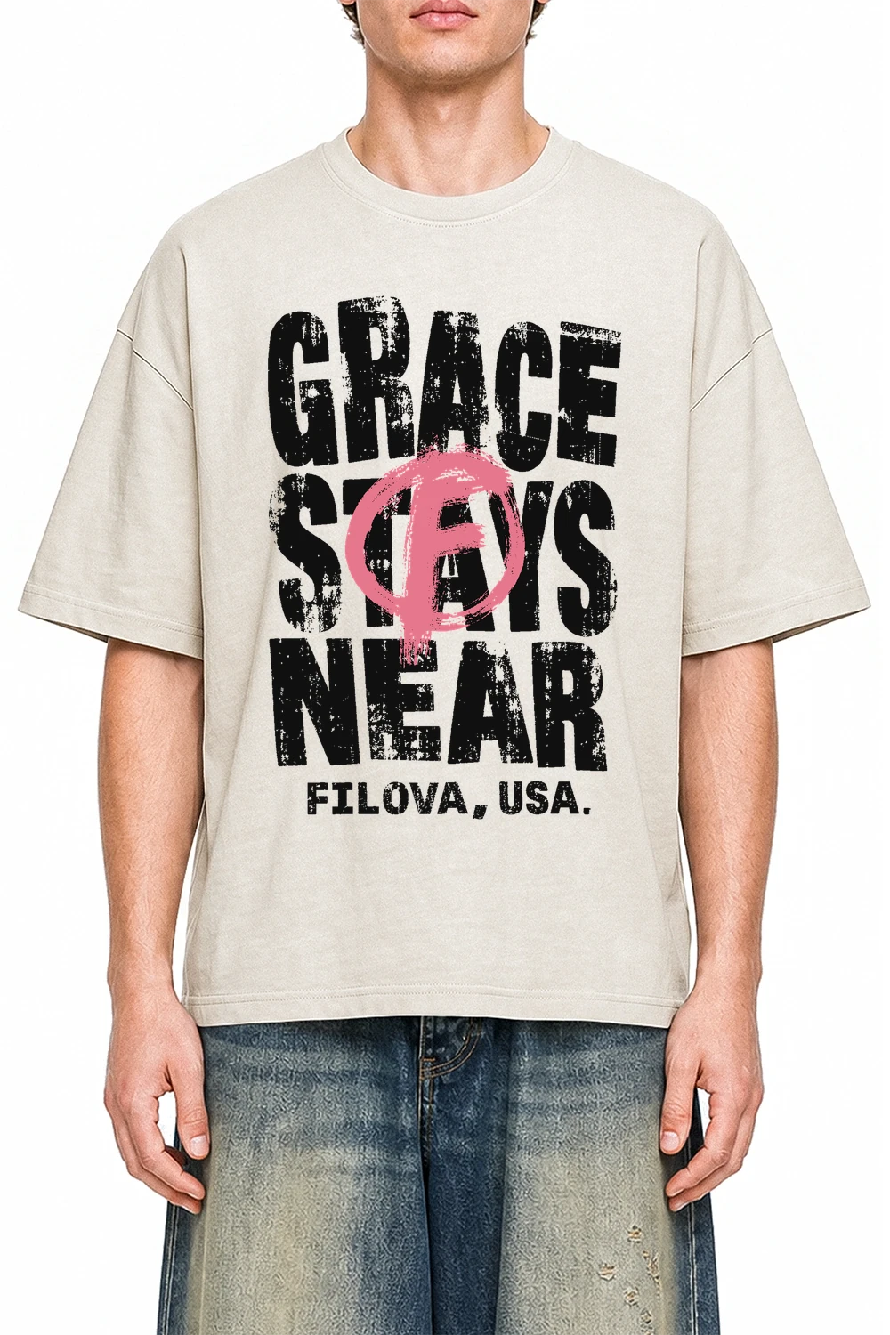 Grace Stays Near Apricot graphic T-shirt on model, front view