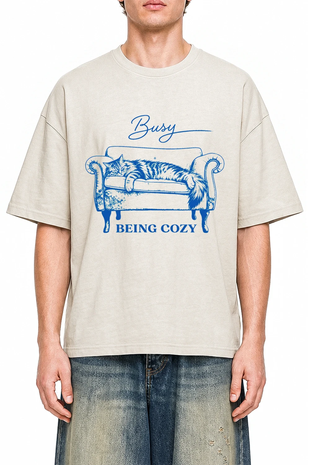 Busy Being Cozy Apricot graphic T-shirt on model, front view