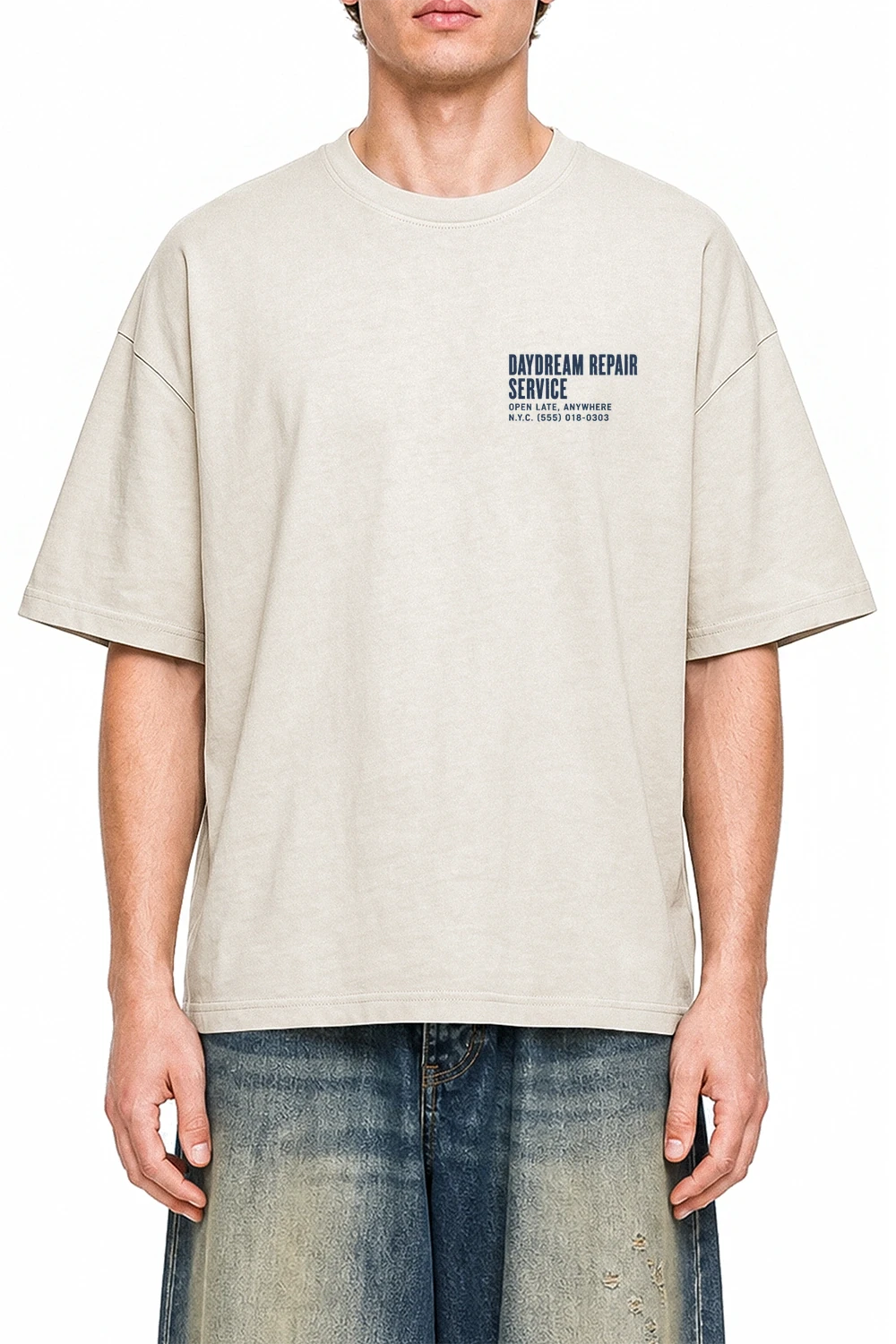 Daydream Repair Service Apricot graphic T-shirt on model, front view