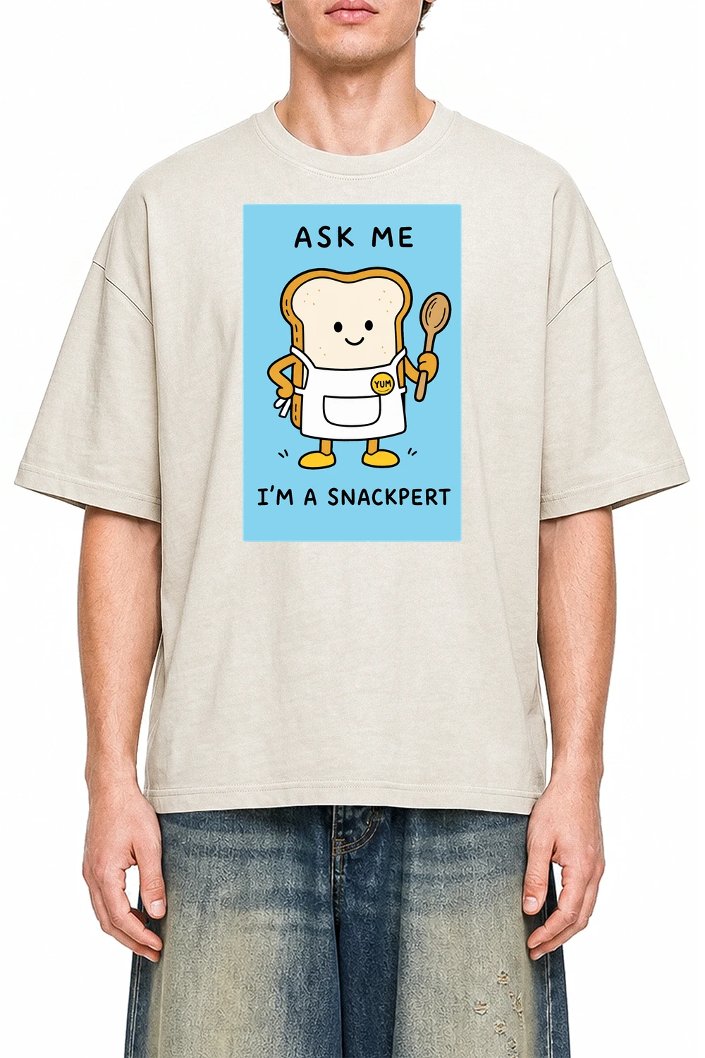 Snackpert Apricot graphic T-shirt on model, front view
