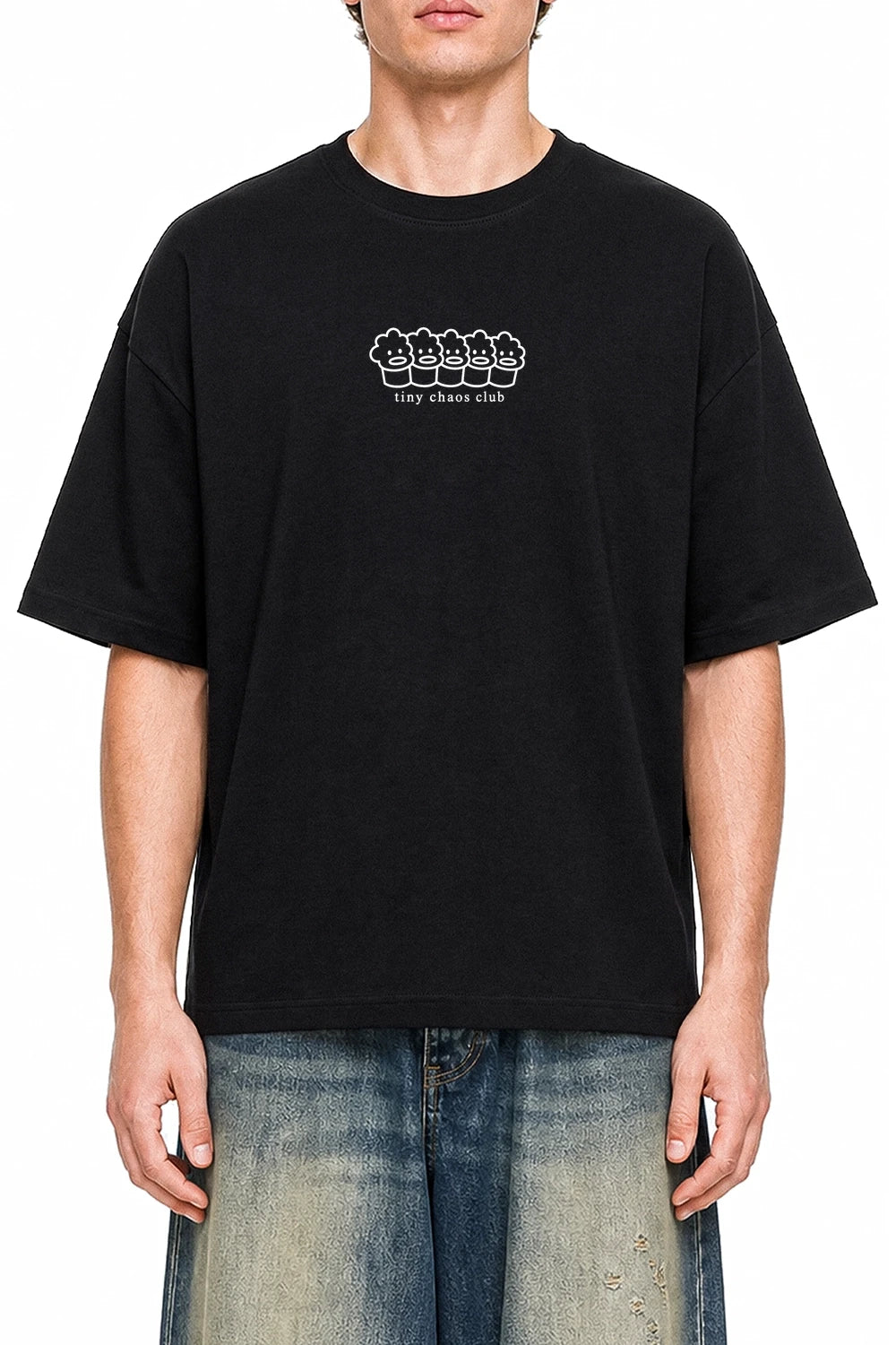 Tiny Chaos Club Black graphic T-shirt on model, front view