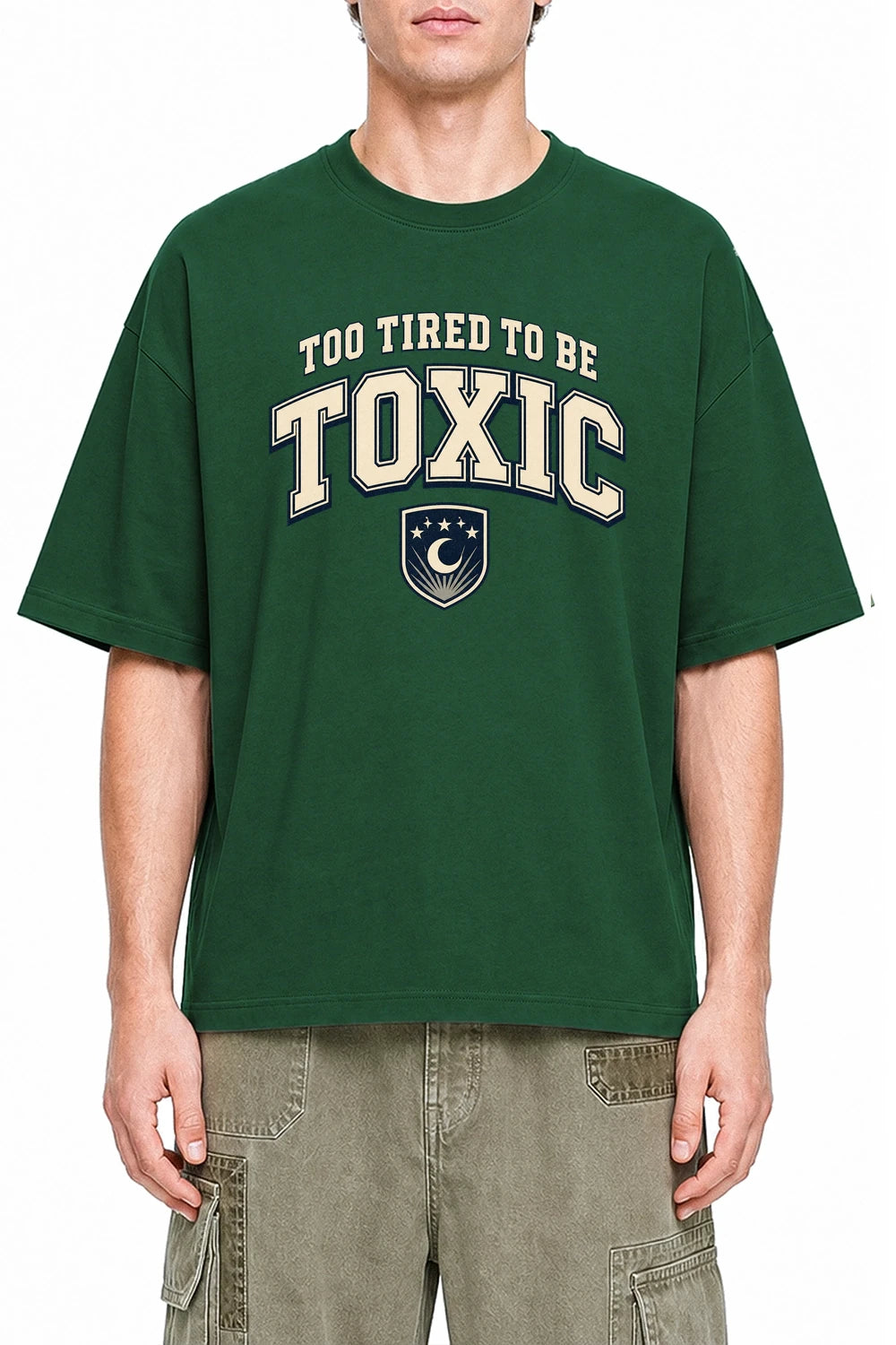 Too Tired To Be Toxic Dark Green graphic T-shirt on model, front view