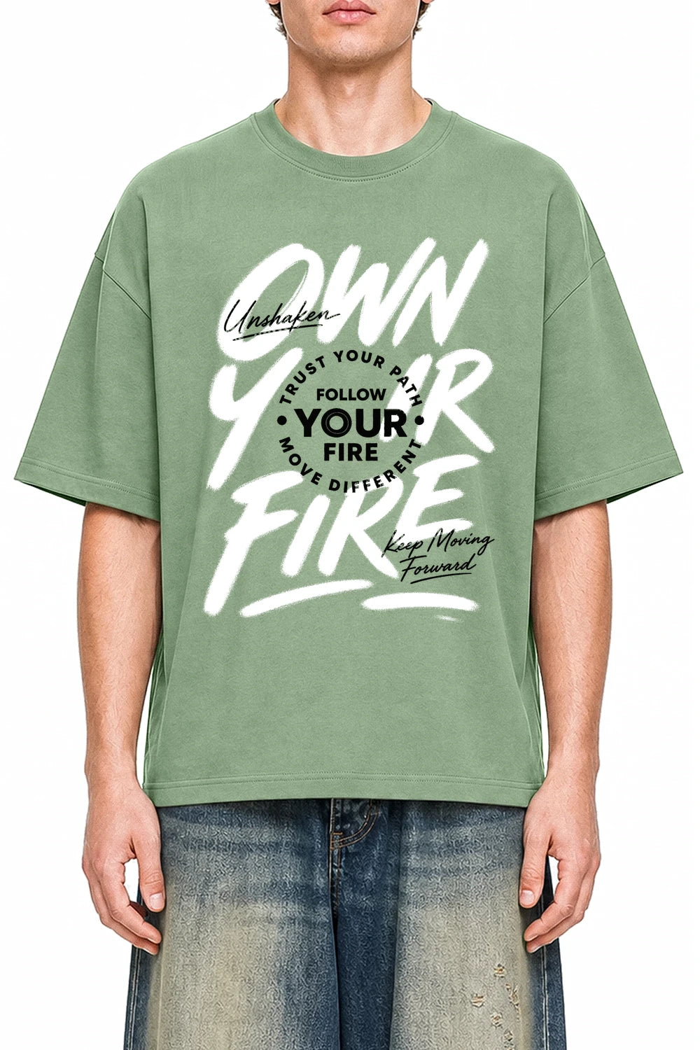Own Your Fire Light Green graphic T-shirt on model, front view
