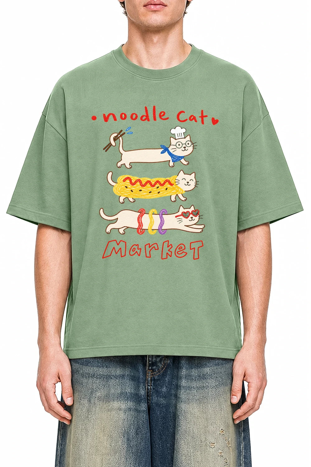 Noodle Cat Market Light Green graphic T-shirt on model, front view