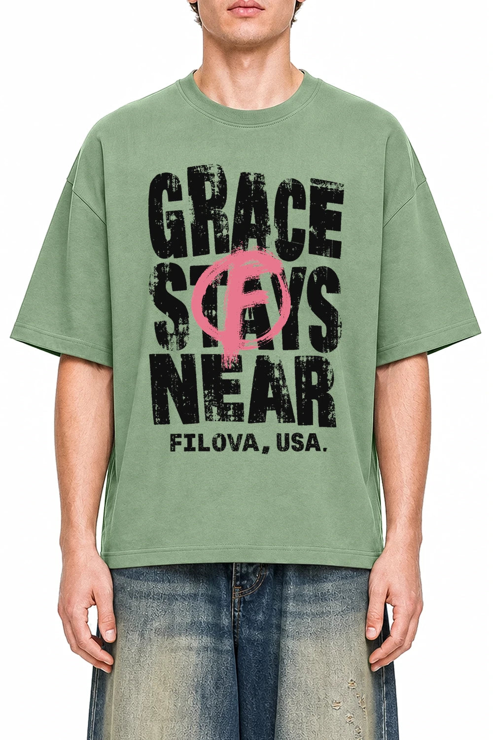 Grace Stays Near Light Green graphic T-shirt on model, front view