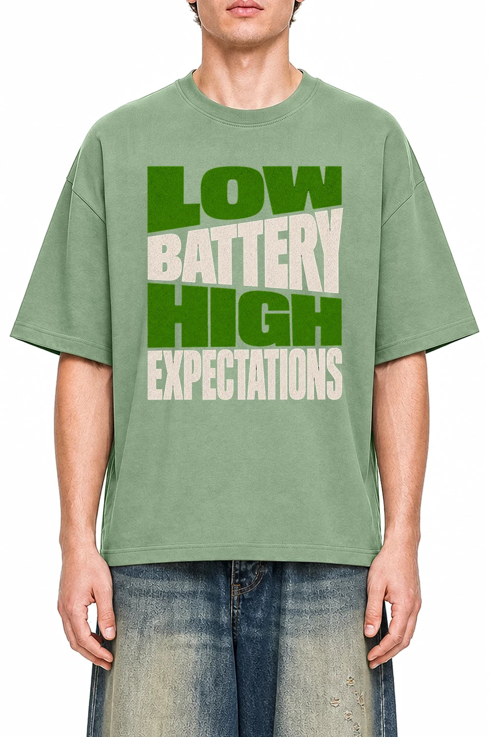Low Battery High Expectations Light Green graphic T-shirt on model, front view