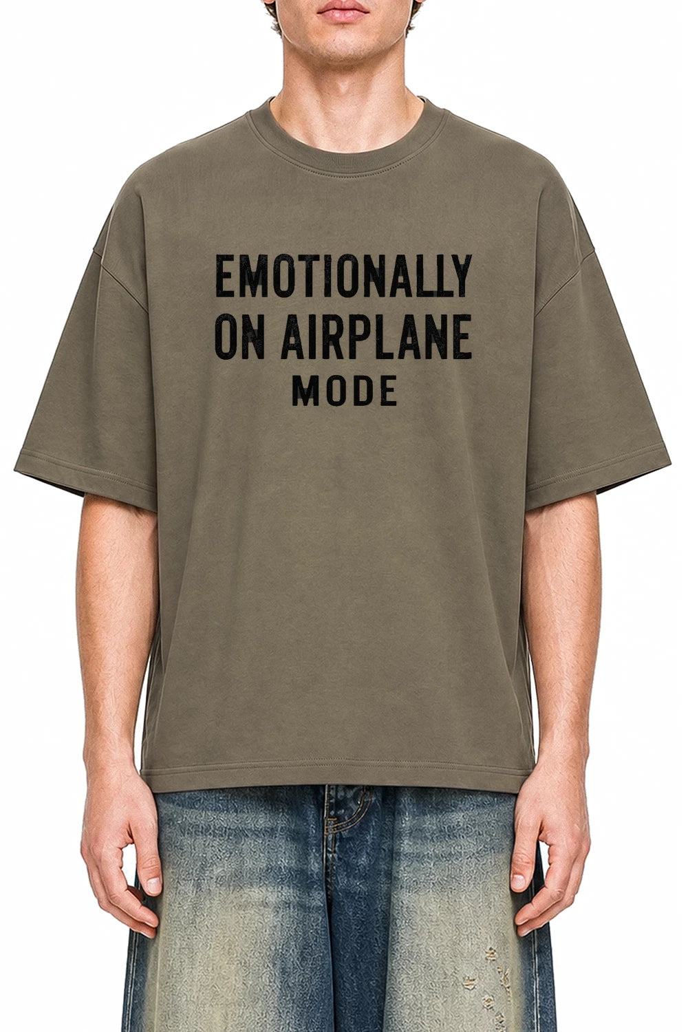 Emotionally On Airplane Mode Moss Green graphic T-shirt on model, front view