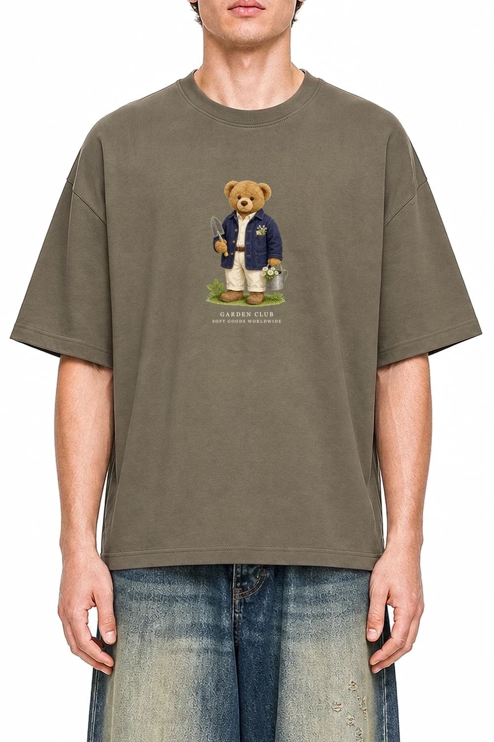 Garden Club Bear Moss Green graphic T-shirt on model, front view