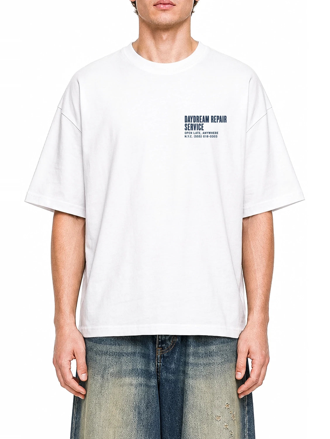 Daydream Repair Service White graphic T-shirt on model, front view