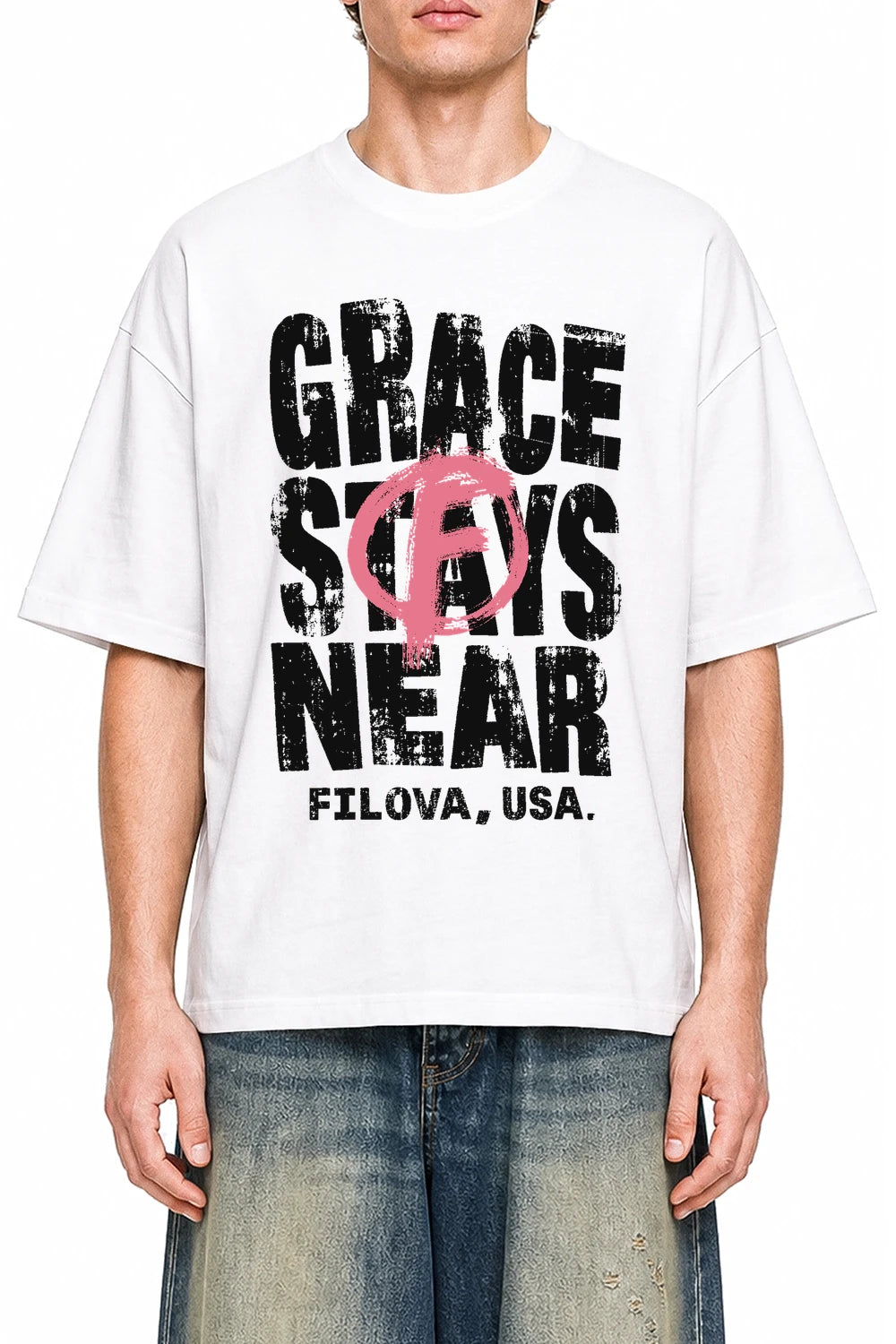 Grace Stays Near White graphic T-shirt on model, front view