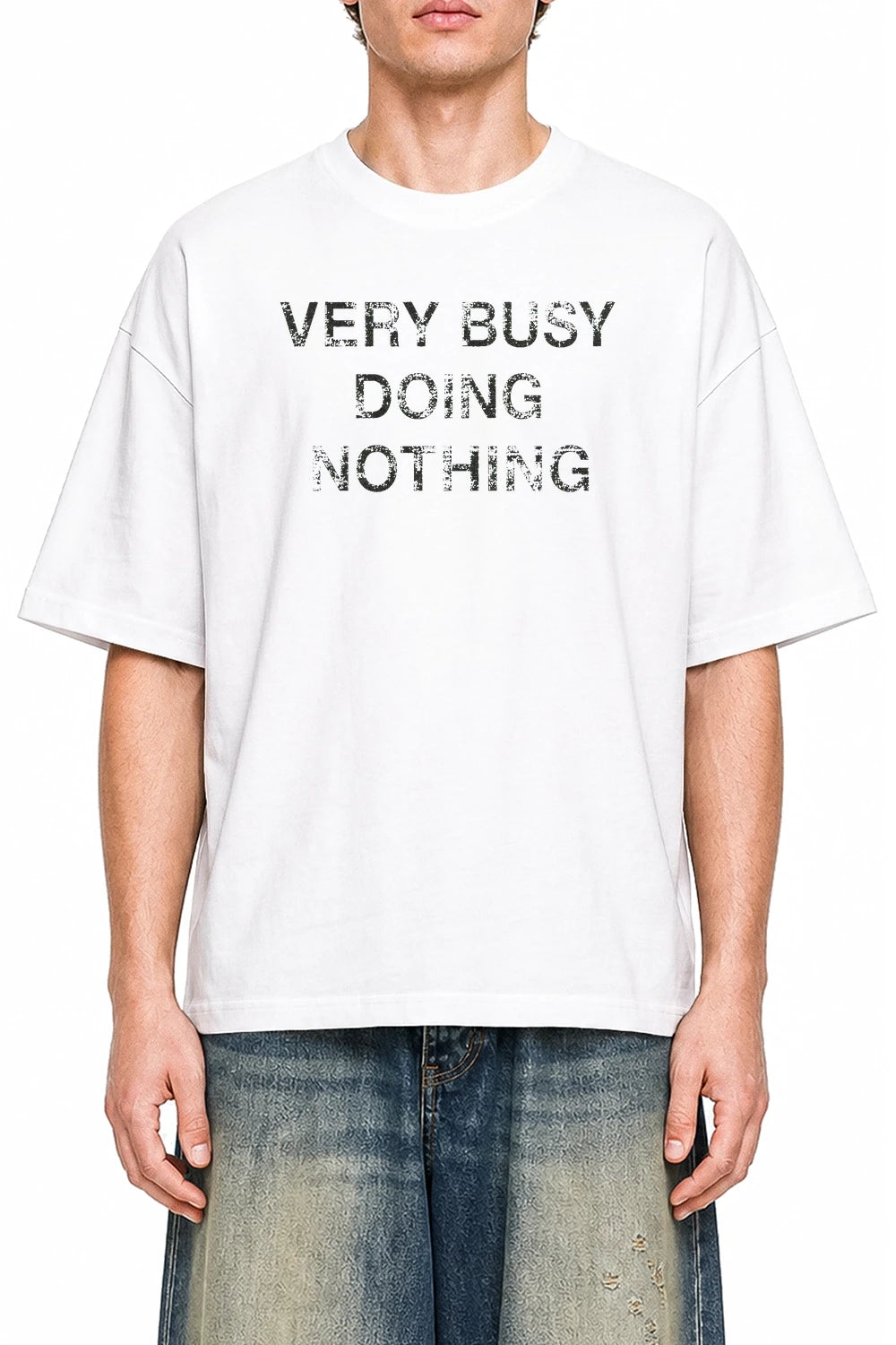 Very Busy Doing Nothing White graphic T-shirt on model, front view