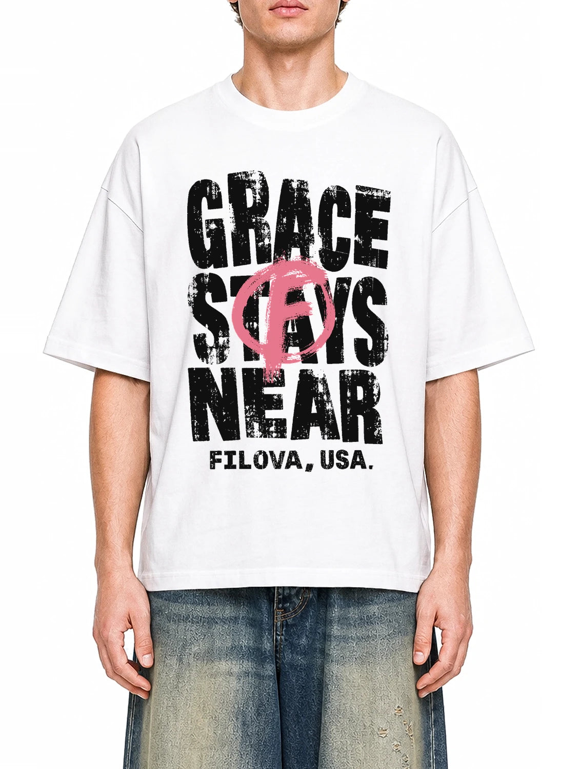 Grace Stays Near White graphic T-shirt on model, front view