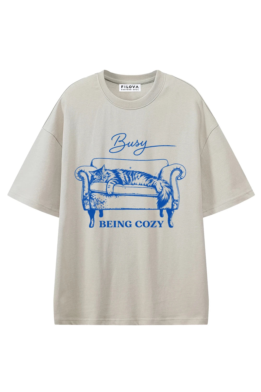 Busy Being Cozy Apricot graphic T-shirt, front view