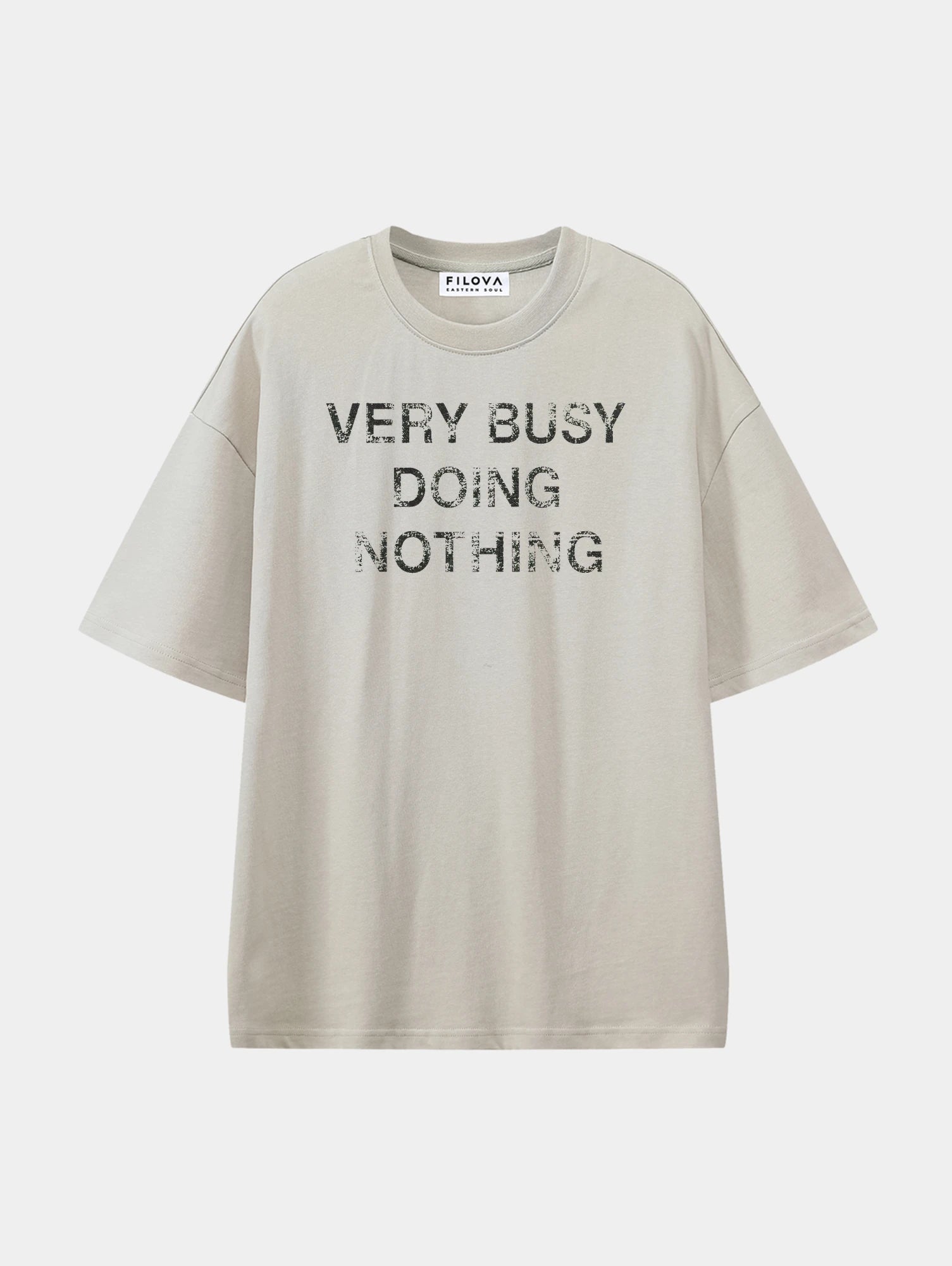 Very Busy Doing Nothing Apricot graphic T-shirt, front view
