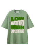 Low Battery High Expectations Light Green graphic T-shirt, front view